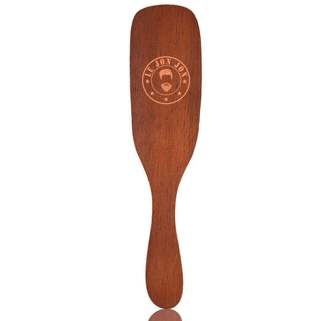 Paddle shaped brush